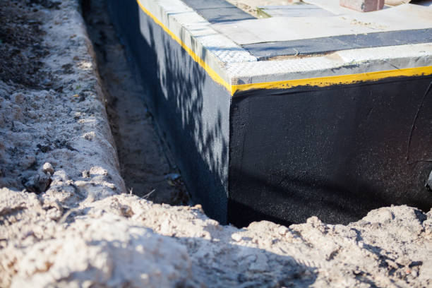 Professional Waterproofing technician working in Pleasant Ridge, MI